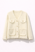 Chaqueta texturizada color crema con hilo metálico sutil