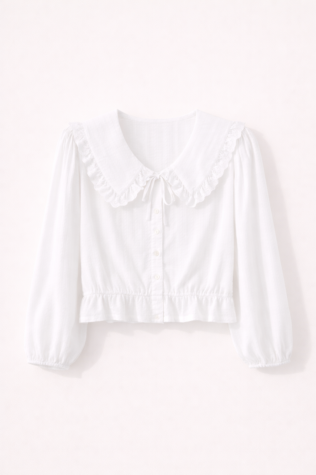 Blusa de algodón suave con volantes y encaje