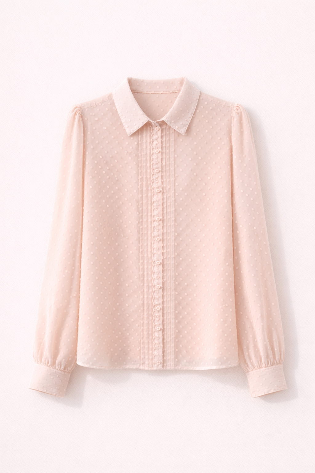 Blusa con pliegues y lunares suizos en color rosa melocotón