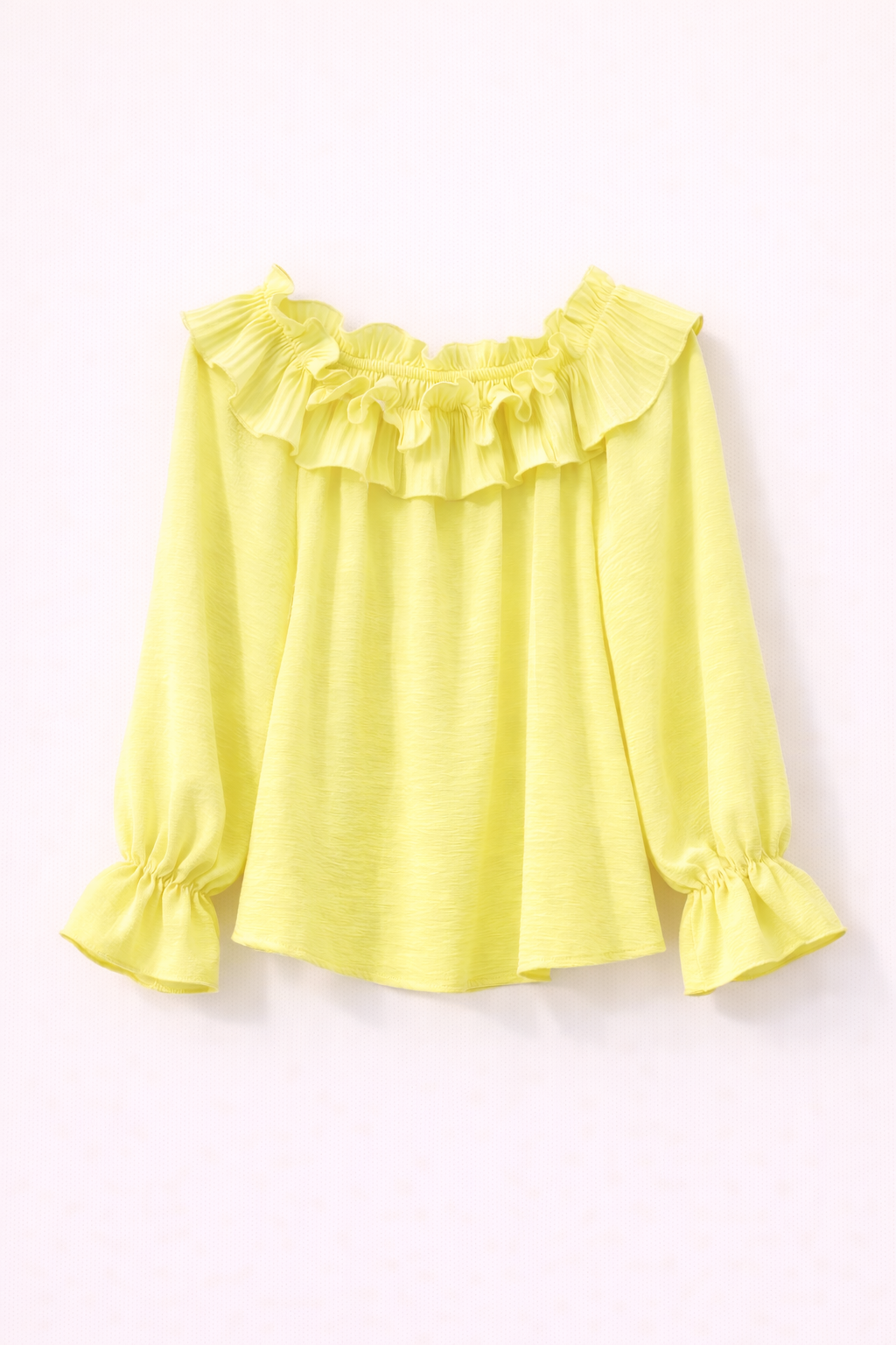 Blusa texturizada con volantes y hombros descubiertos