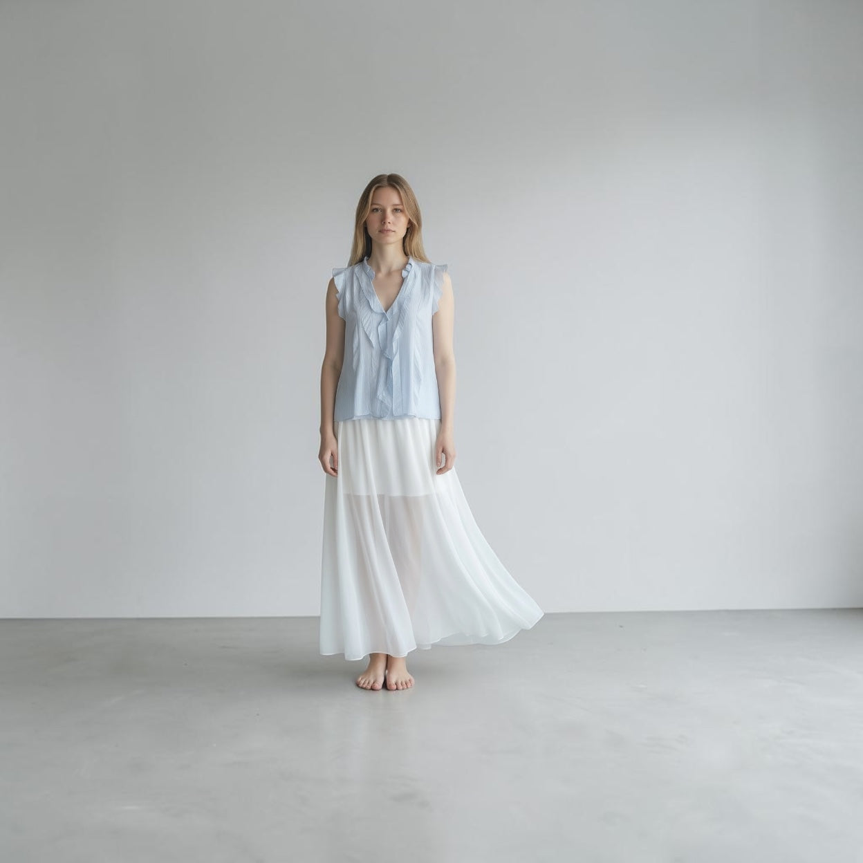 Soft Sky Blue Ruffle Trim Sleeveless Blouse in Tencel Blend